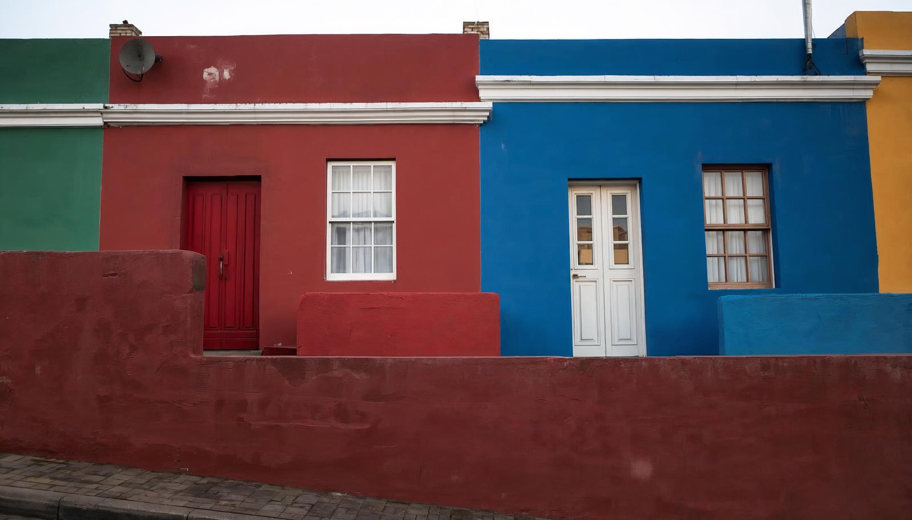 Brightly painted red, blue and green houses in the Bo-Kaap, Cape Town